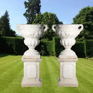 Pair of Giant Fruit design Stone Vases on Plinths