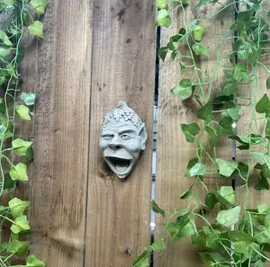 Stone Cast Cheeky Winking Sprite garden Plaque