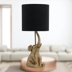 First Choice Lighting Elephant Gold Resin Table Lamp With Black Fabric Shade