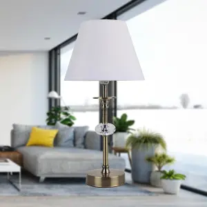 First Choice Lighting Antique Brass Plated Stacked Bedside Table Light Faceted Detail White Fabric Shade