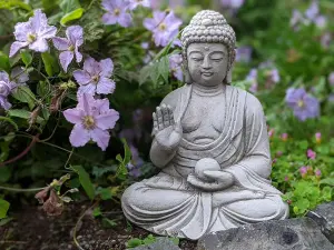 Small Buddha with Ball in Hand Garden Statue