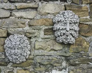 Green Man & Woman Stone Cast Leaf Wall Plaques