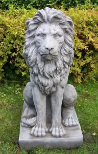 Pair of stunning large sitting lion statues