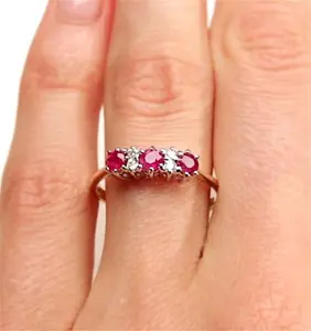 Ruby 0.58Ct And Diamond 9K Gold Ring