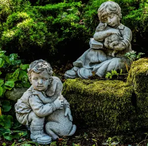 Sweet Boys Statues with Cat and Puppy in hands