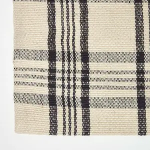 Homescapes Logan Black and White Tartan Check Non-Slip 100% Wool Rug, 150 x 240 cm