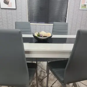 Modern White and Black Wood Dining Table With 4 Grey Chairs