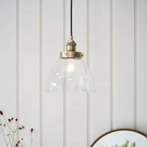 Anson Lighting Pampa Pendant light finished in Antique brass plate and clear glass