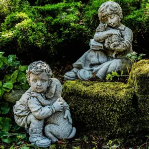 Sweet Boys Statues with Cat and Puppy in hands