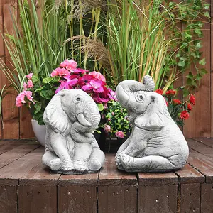 Pair of Small Playful Elephant Stone Ornaments