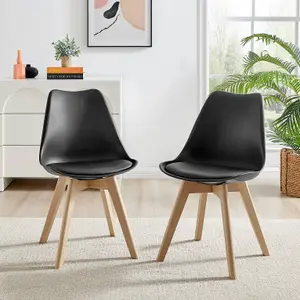 Furniturebox Seattle Scandi Inspired Glass and White Leg Square Dining Table & 4 Black Cushioned Stockholm Beech Wood Leg Chairs