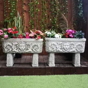 Pair of Lion design Stone Troughs on legs