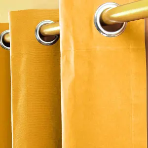 Homescapes Cotton Plain Mustard Yellow Ready Made Eyelet Curtain Pair, 117 x 137cm