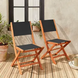 sweeek. Pair of foldable wooden garden chairs Almeria Black 54x58.7x89 cm