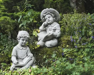 Large Reading Boy and Girl Statues in Sitting pose