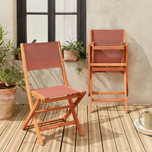 sweeek. Pair of foldable wooden garden chairs Almeria Terracotta 50x58.7x89 cm