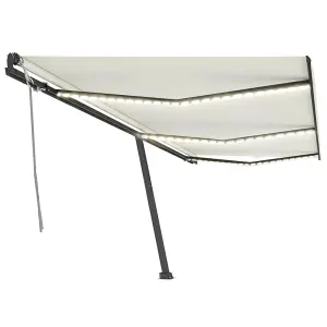 Berkfield Manual Retractable Awning with LED 600x350 cm Cream