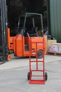 Solid Wheel Sack Truck, Tubular Red Steel, 2 Heavy Duty Solid Wheels, Fixed Toe Plate, Rubber Gripped Handles - 150kg Capacity