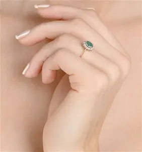 Emerald 0.83Ct And Diamond 9K Gold Ring