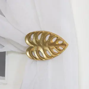 Melody Maison Pair of Gold Monstera Leaf Curtain Holdbacks