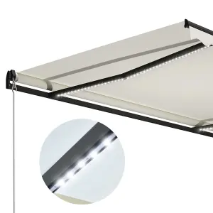 Berkfield Manual Retractable Awning with LED 600x300 cm Cream