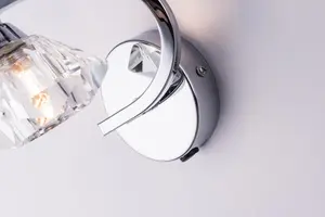 Single Left Curved Wall Light and Sconce, Clear Glass Shade, Polished Chrome Finish