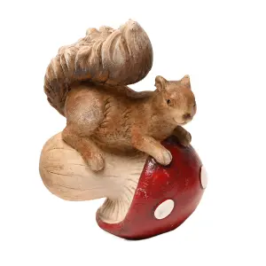 Country Living Squirrel Tipping a Mushroom Over Ornament