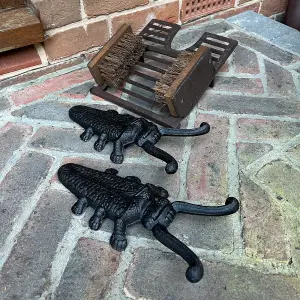 Cast Iron Boot Jack and Scraper with a Pair of Beetle Boot Jacks