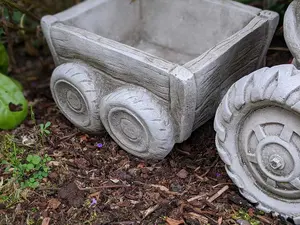 Boy on Tractor with Small Planter Trailer