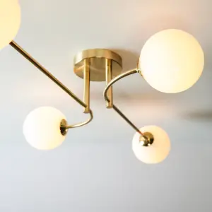 Anson Lighting Consort 4lt Semi Flush light finished in Satin brass plate and opal glass