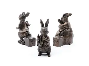 Beatrix Potter Bronze Peter Rabbit Plant Pot Feet - Set of 3 - Peter Eating Carrots, Running and Hugging - L6.5 x W8 x H11 cm