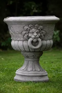 Pair of Lion Head design Stone Vases and Planter Troughs