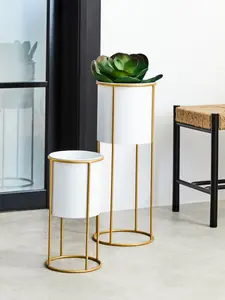 Interiors by Premier Sleek And Sturdy Large Black And Gold Floor Standing Planter, Stylish And Functional Outdoor Garden Pots