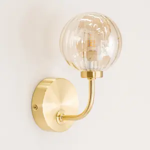 ValueLights Chessy Pair of - Gold Metal Curved Wall Light with Amber Ribbed Glass Globe Shade