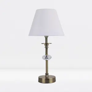 First Choice Lighting Antique Brass Plated Stacked Bedside Table Light Faceted Detail White Fabric Shade