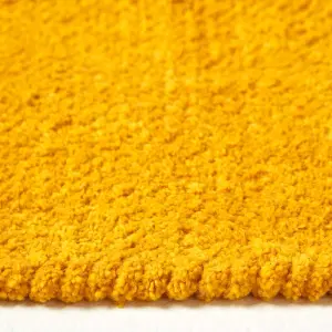 Homescapes Mustard 100% Cotton Plain Chenille Rug with Natural Trim, 45 x 70 cm