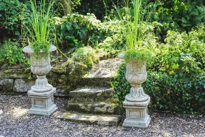 Pair of Large Victorian Stone Cast Urns with Plinths