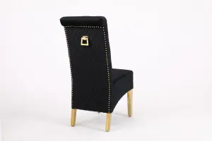 A Pair of Velvet Dining Chairs with Golden Legs in Black