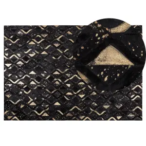 Cowhide Area Rug 140 x 200 cm Black and Gold DEVELI