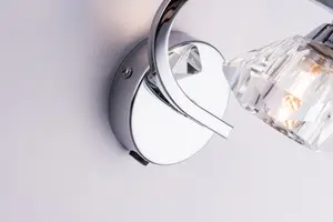 Single Right Curved Wall Light and Sconce, Clear Glass Shade, Polished Chrome Finish