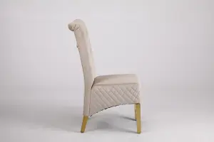 A Pair of Velvet Dining Chairs with Golden Legs in Cream