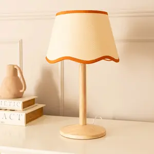 ValueLights Triston Natural Light Wood Stem Table Lamp with Scallop Rust Trim Tapered Lamp Shade and LED Bulb