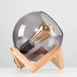 ValueLights Cruz Modern Smoked Effect Glass Globe Bedside Table Lamp on a Wooden Frame Base