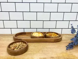 Set Of Three Bowls On Wooden Tray