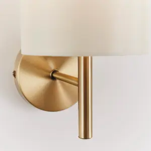 Anson Lighting Phoenix Wall light finished in Antique brass plate and cream fabric