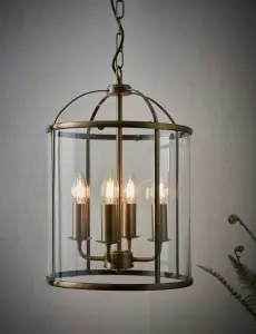 Anson Lighting Powell 4lt Pendant light finished in Antique brass plate and clear glass