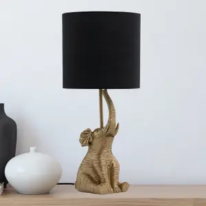 First Choice Lighting Elephant Gold Resin Table Lamp With Black Fabric Shade