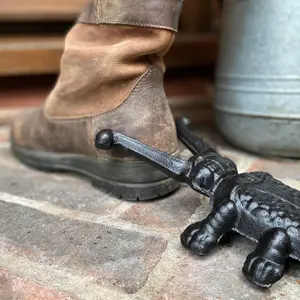 Cast Iron Boot Jack and Scraper with a Pair of Beetle Boot Jacks