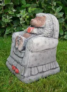 Adorable Hedgehog in chair garden ornament