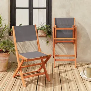 sweeek. Pair of foldable wooden garden chairs Almeria Anthracite 50x58.7x89 cm